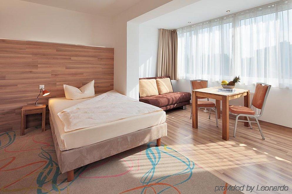 Petul Apart Hotel City Garden Есен Стая снимка